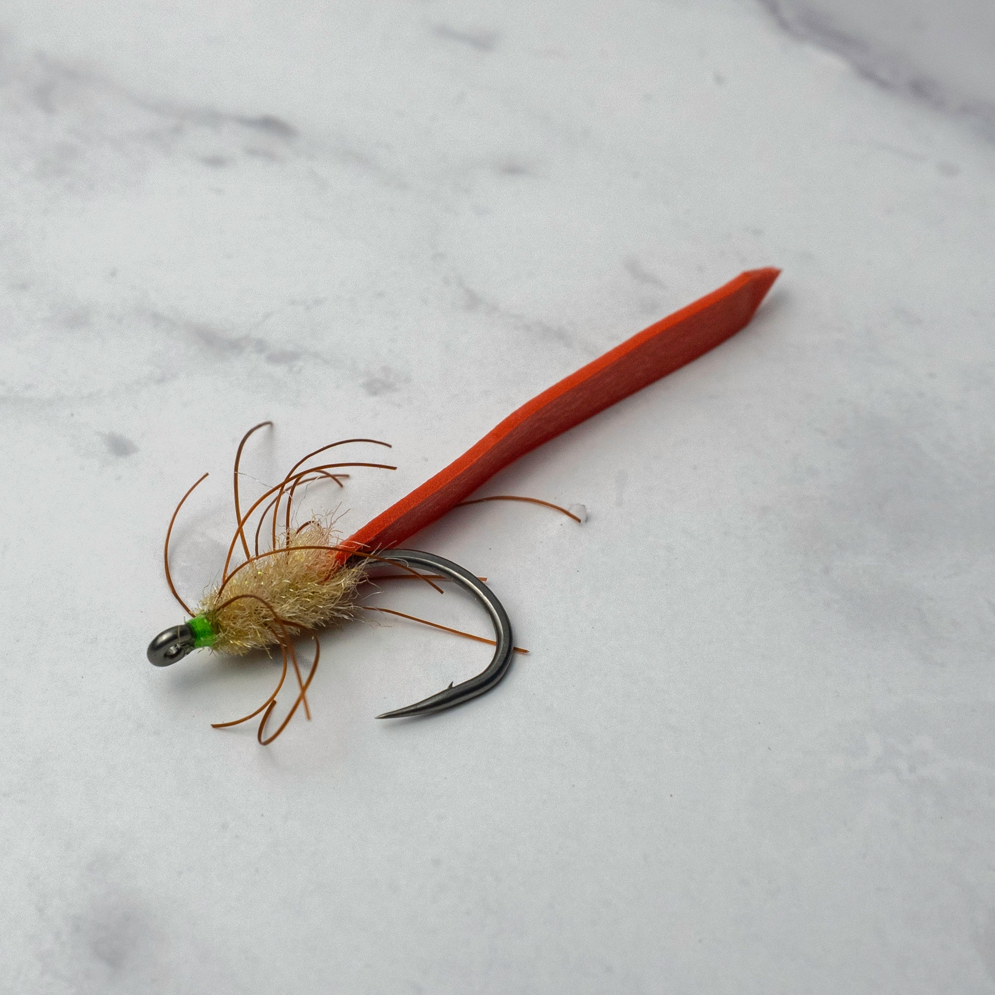 Lightweight palolo worm imitation fly designed for Florida Keys tarpon during seasonal worm hatch migrations and surface feeding events.