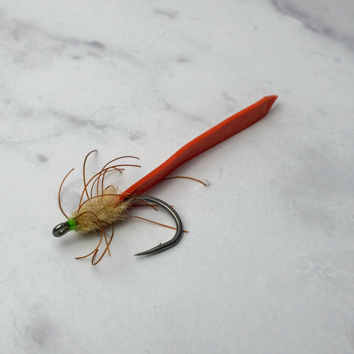 Lightweight palolo worm imitation fly designed for Florida Keys tarpon during seasonal worm hatch migrations and surface feeding events.