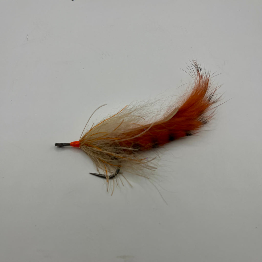 Full profile view of Tarpon Cigar fly in tan and rust, imitation for clear-water and pressured tarpon