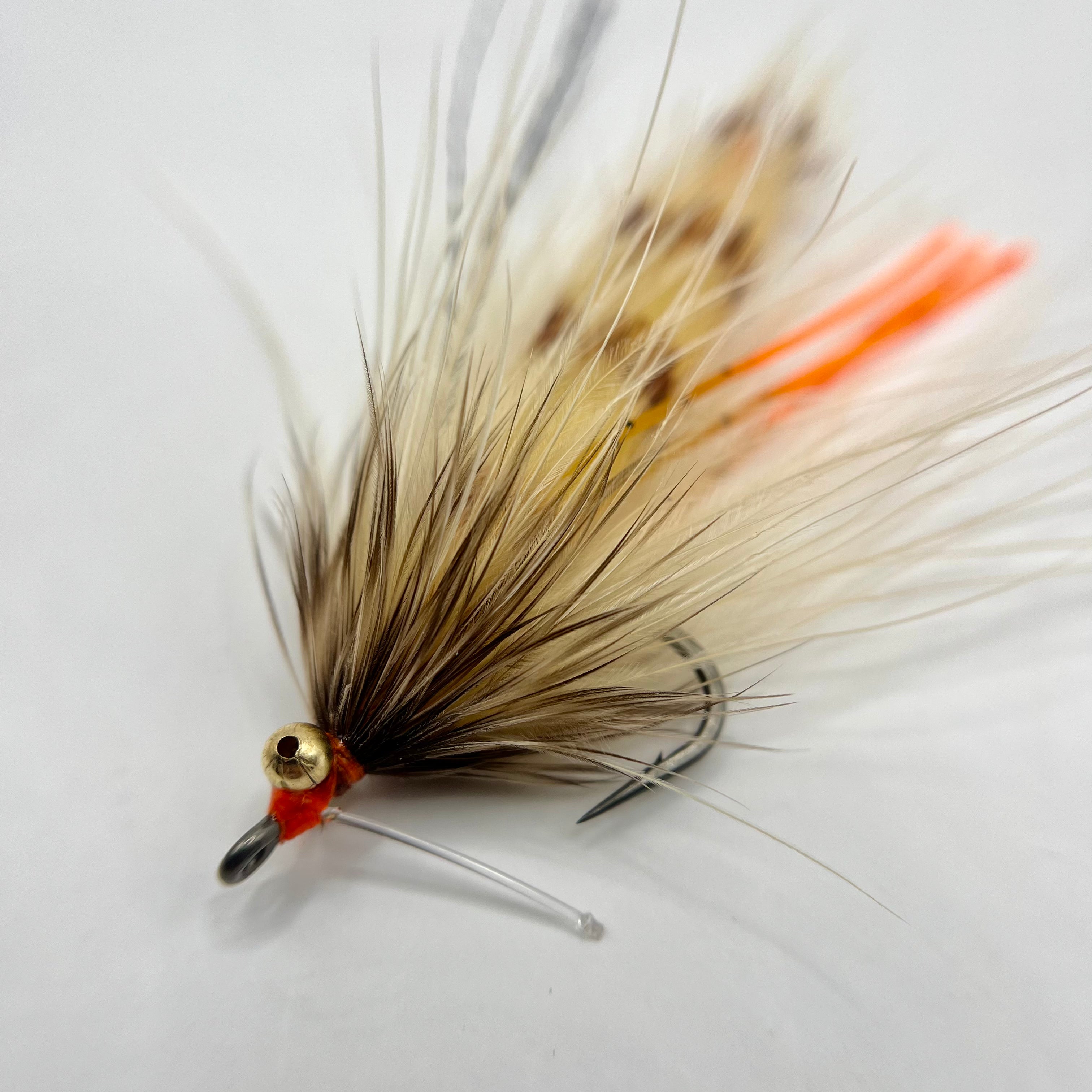 Close-up macro of the tan Stalker Shrimp fly showing realistic segmentation, subtle tones, and flowing materials designed for natural motion.