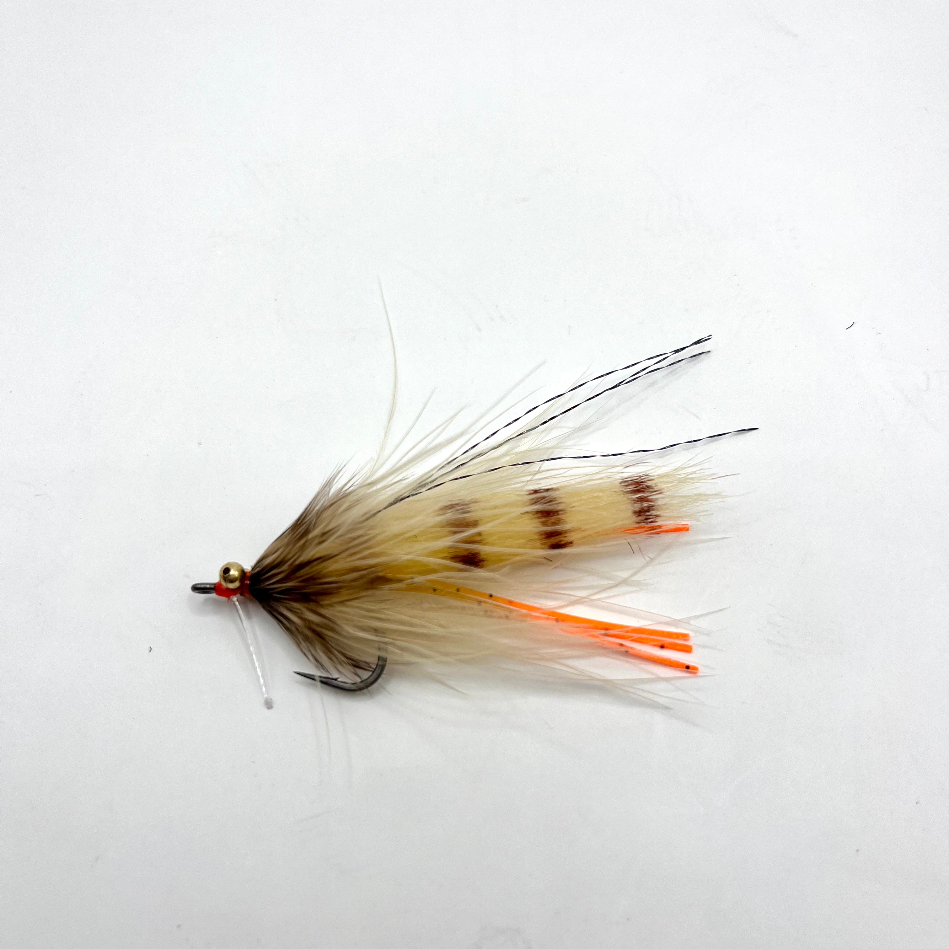 Side profile of the tan Stalker Shrimp fly displaying natural coloration, slim presentation profile, and structure-ready design.