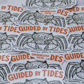 Mangrove crab illustration sticker with “Guided By Tides” text in orange and Southern Style Fly Co branding on a white background.