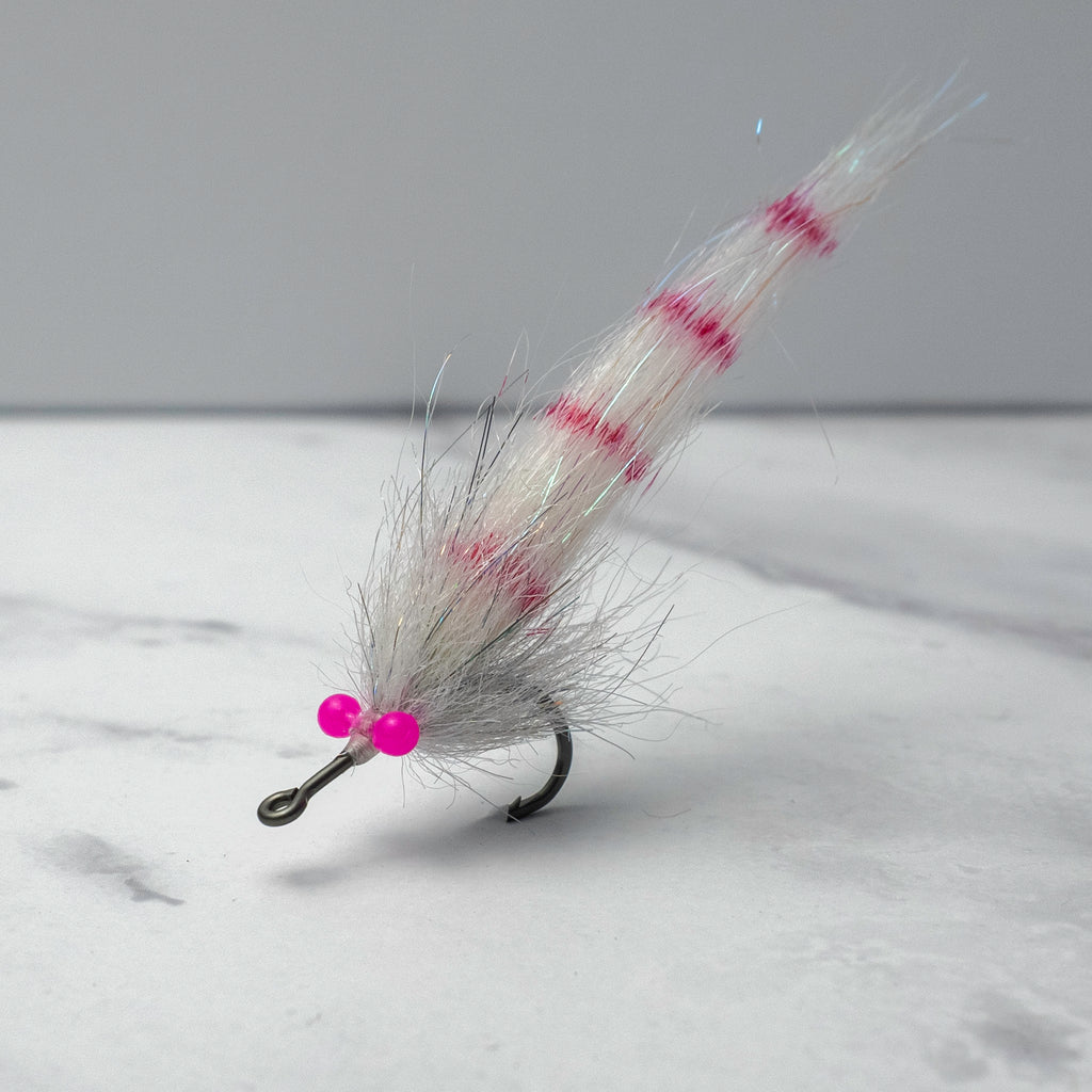 White and pink Sawgrass Shrimp pattern designed for clear-water juvenile tarpon and shallow mangrove fisheries.