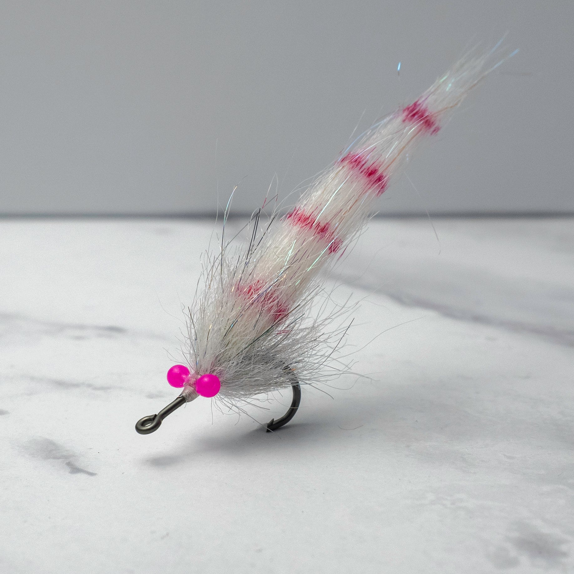White and pink Sawgrass Shrimp pattern designed for clear-water juvenile tarpon and shallow mangrove fisheries.
